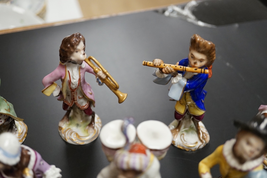 A group of twenty German porcelain monkey band figures, largest 15.5cm high